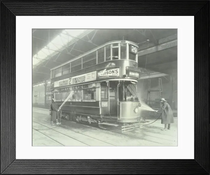 Framed Print : Transport workers washing a tram at the Holloway Car Shed, London, 1932 Framed Print : Transport workers washing a tram at the Holloway Car Shed, London, 1932