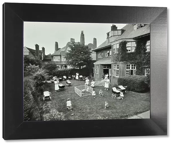 Children and carers in a garden, Hampstead, London, 1960