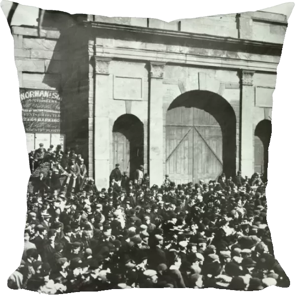Crowd outside the closed East India Dock Gates, Poplar, London, 1897