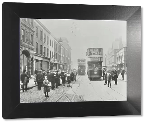 Pedestrians and trams in Commercial Street, Stepney, London, 1907