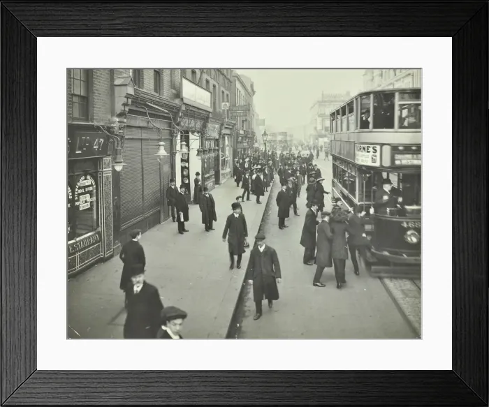 Framed Print : People rushing to get on a trolley bus at 7. 05 am, Tooting Broadway, London, April 1912