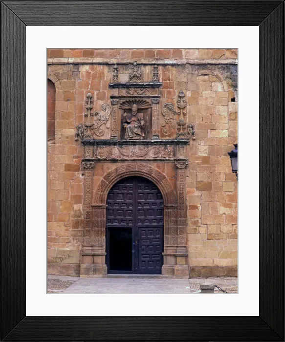 Framed Print : Front door of St. Peters Cathedral, crowned by the seated image of Saint Peter Pope Framed Print : Front door of St. Peters Cathedral, crowned by the seated image of Saint Peter Pope