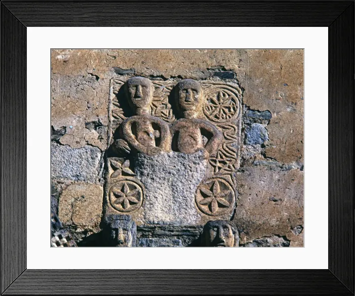 Framed Print : Adam and Eve after the Original Sin, bas-relief on the facade of the church Framed Print : Adam and Eve after the Original Sin, bas-relief on the facade of the church