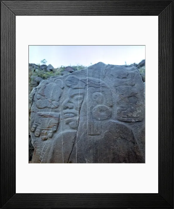 Framed Print : Detail of a sculptural relief on a rock representing a man with a large earring Framed Print : Detail of a sculptural relief on a rock representing a man with a large earring