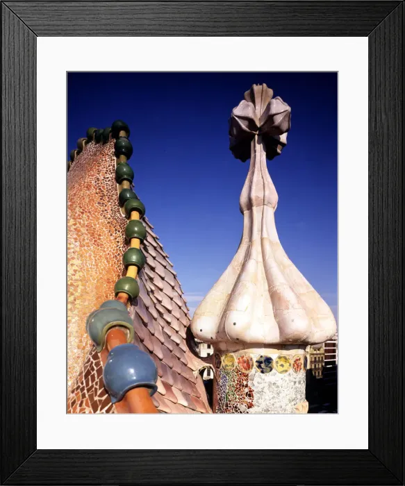 Framed Print : Upper finishing of the facade of Batllo House with a pinnacle finished in a four-armed cross Framed Print : Upper finishing of the facade of Batllo House with a pinnacle finished in a four-armed cross