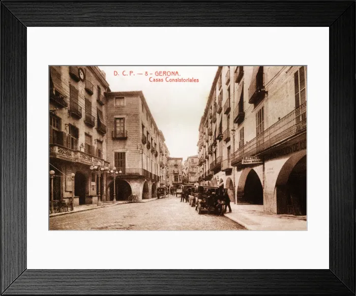 Framed Print : Public vehicles parked on Vi Square, in front of the town hall in Girona, in a postcard Framed Print : Public vehicles parked on Vi Square, in front of the town hall in Girona, in a postcard