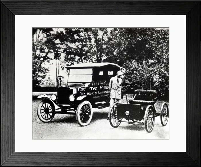 Framed Print : Henry Ford with old models of the Ford trademark