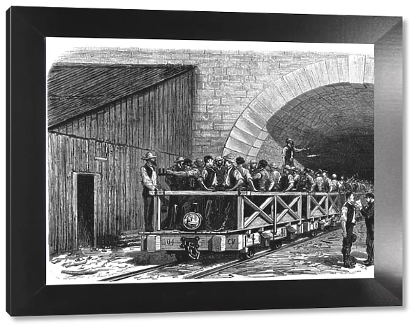 Tunnel opening of the Alps, workers exiting after a working day by the French mouth