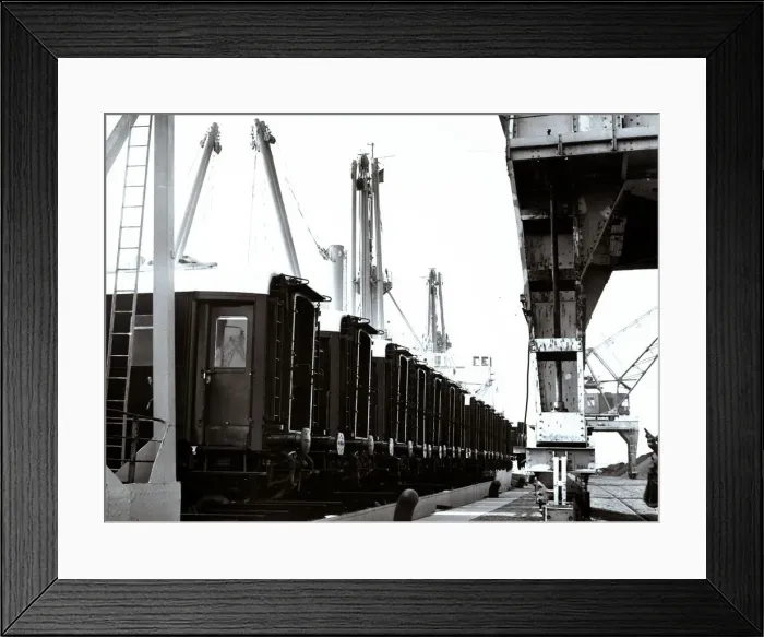 Framed Print : Loading and transport of train wagons in the port of Zeebrugge - Bruges, Belgium Framed Print : Loading and transport of train wagons in the port of Zeebrugge - Bruges, Belgium