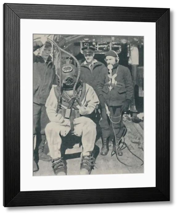 Framed Print : American Naval Diver wears three-fingered watertight rubber gloves, 1937 Framed Print : American Naval Diver wears three-fingered watertight rubber gloves, 1937