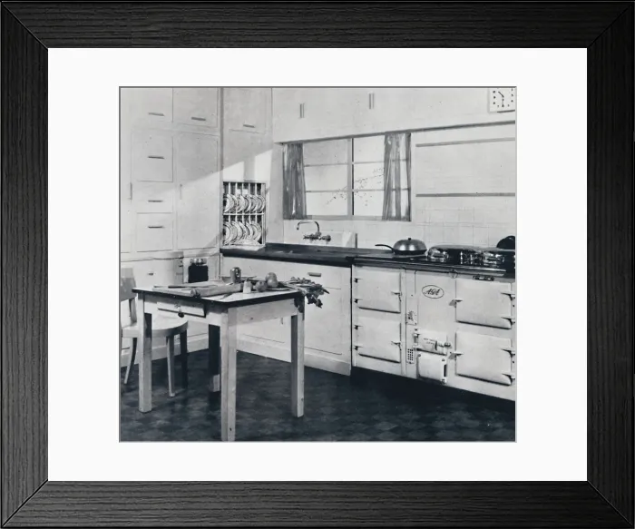 Framed Print : Aga Heat Ltd. The Model F Aga Cooker (for a large house) finished in black and cream Framed Print : Aga Heat Ltd. The Model F Aga Cooker (for a large house) finished in black and cream