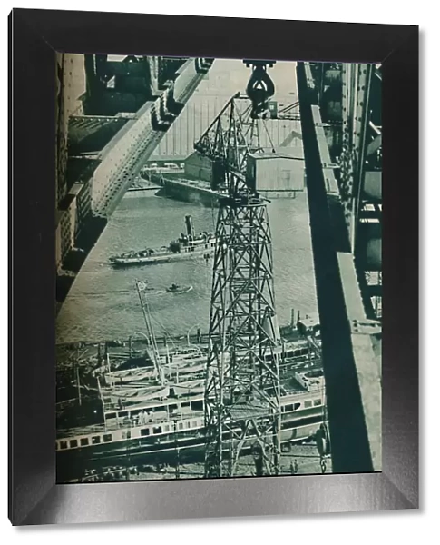 Seen from a crane, the River Clyde has appearance of a long narrow dock basin, 1937