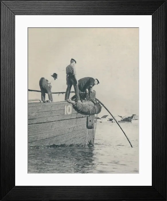 Framed Print : Shore End of a submarine cable is generally laid from a lighter, 1937 Framed Print : Shore End of a submarine cable is generally laid from a lighter, 1937