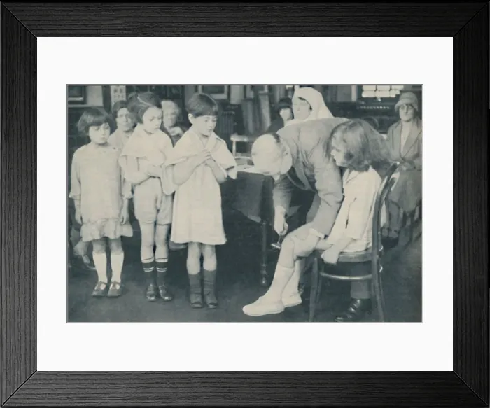 Framed Print : Testing the patella reflex for indication of nervous disease, c1935 Framed Print : Testing the patella reflex for indication of nervous disease, c1935
