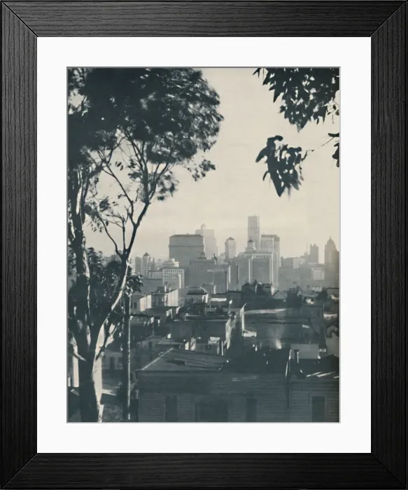 Framed Print : Dwellings of Homely Timber in the Shadow of Concrete Giants, c1935 Framed Print : Dwellings of Homely Timber in the Shadow of Concrete Giants, c1935