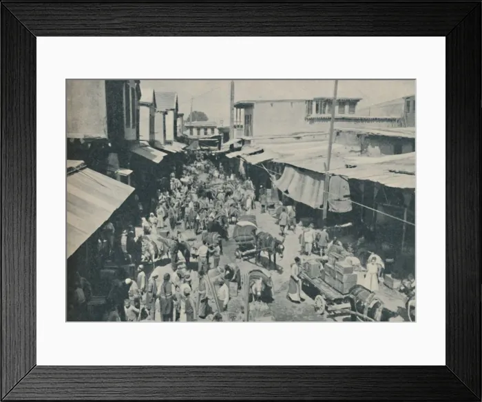 Framed Print : Chaffering Oriental Crowds That Throng The Street Markets, c1935. Artist: Charles H Gabriel Framed Print : Chaffering Oriental Crowds That Throng The Street Markets, c1935. Artist: Charles H Gabriel