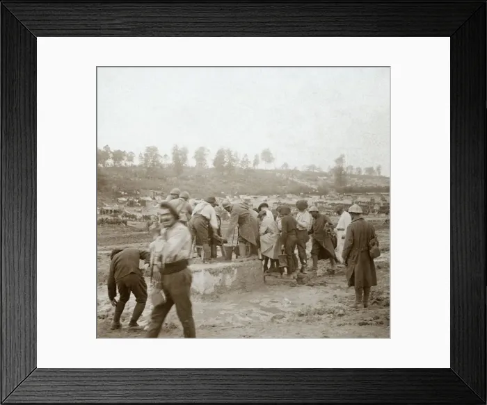 Framed Print : Soldiers queuing in the mud for water, Genicourt, northern France, c1914-c1918 Framed Print : Soldiers queuing in the mud for water, Genicourt, northern France, c1914-c1918
