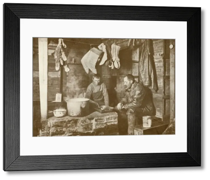 Framed Print : Meares and Demetri at the Blubber Stove in the Discovery Hut, 3 November 1911, (1913) Framed Print : Meares and Demetri at the Blubber Stove in the Discovery Hut, 3 November 1911, (1913)