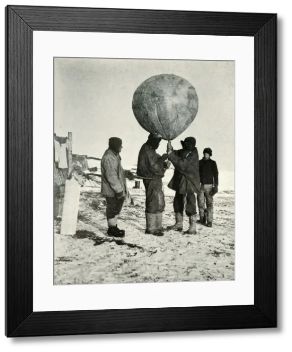 Framed Print : Dr. Simpson Sending Up a Balloon, 1911, (1913). Artist: Herbert Ponting Framed Print : Dr. Simpson Sending Up a Balloon, 1911, (1913). Artist: Herbert Ponting