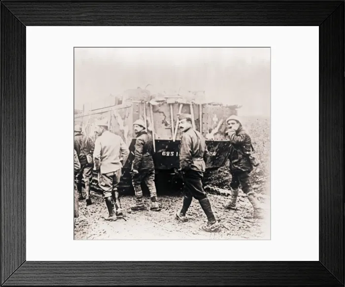 Framed Print : Soldiers walking behind tank, c1914-c1918 Framed Print : Soldiers walking behind tank, c1914-c1918