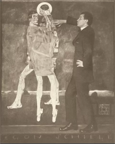 Egon Schiele by the sketch of an unfinished fresco, 1914