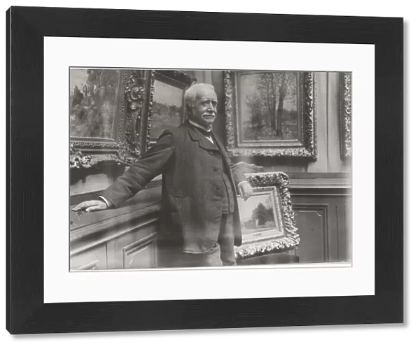 Portrait of Paul Durand-Ruel (1831-1922) in his gallery, c. 1910