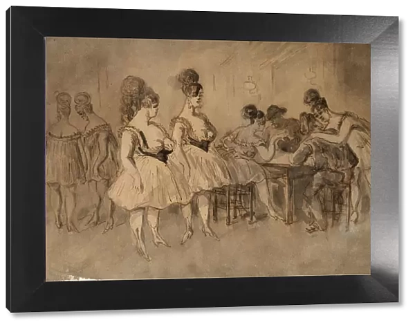 Men with scantily dressed women sitting at the table