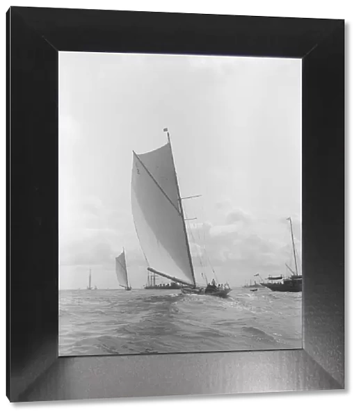 The 19-metre Octavia sailing on a broad reach, 1911. Creator: Kirk & Sons of Cowes
