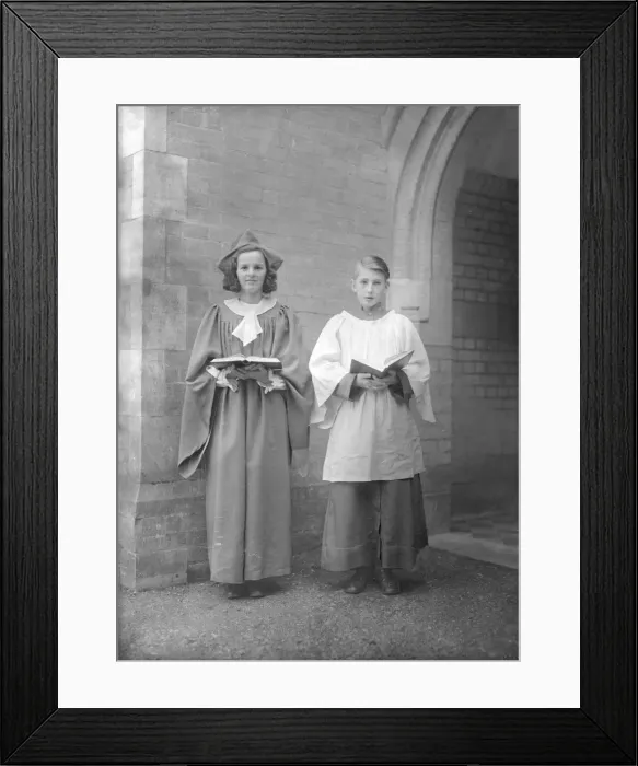 Framed Print : Girl and boy chorister, (Isle of Wight?), c1935. Creator: Kirk & Sons of Cowes Framed Print : Girl and boy chorister, (Isle of Wight?), c1935. Creator: Kirk & Sons of Cowes