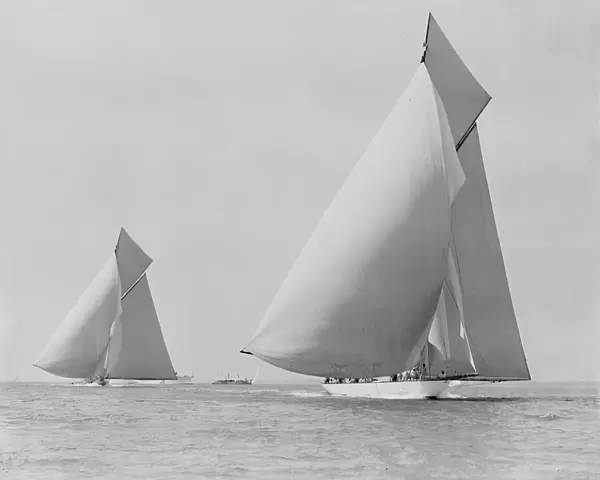 The sailing yachts White Heather and Shamrock, race downwind