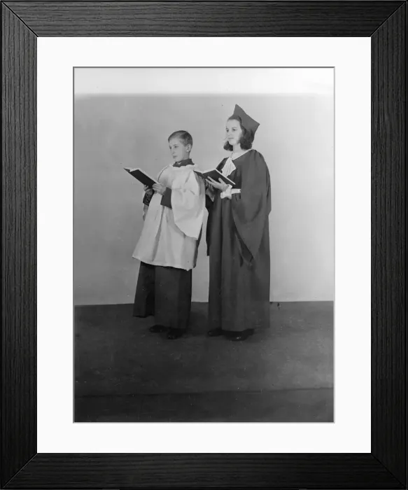 Framed Print : Girl and boy chorister, (Isle of Wight?), c1935. Creator: Kirk & Sons of Cowes Framed Print : Girl and boy chorister, (Isle of Wight?), c1935. Creator: Kirk & Sons of Cowes