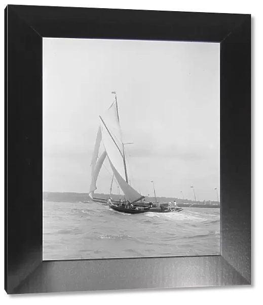 The gaff rigged cutter Bloodhound sailing on a broad reach, August 1912. Creator