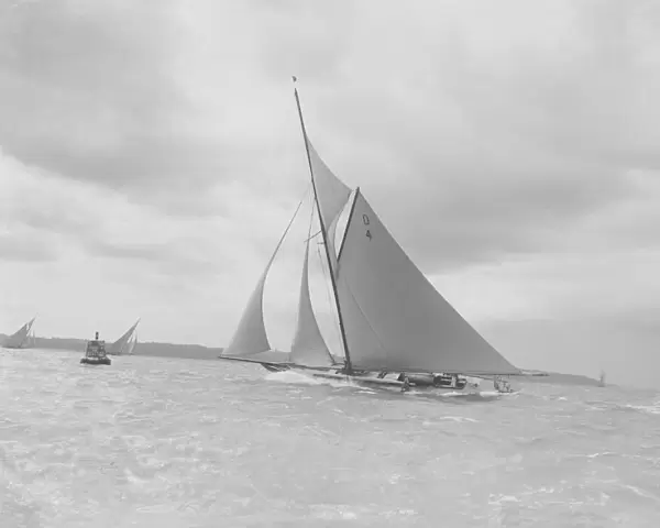 The spectacular 15 Metre Vanity sailing in a good wind, 1912. Creator: Kirk & Sons of Cowes