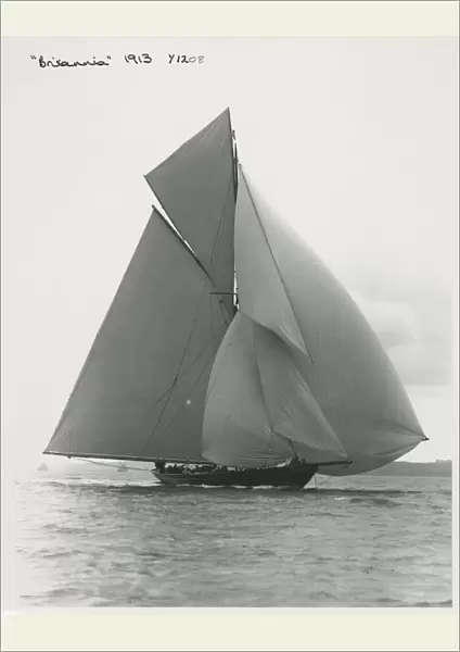 The 221 ton gaff-rigged cutter Britannia sailing under spinnaker, 1913. Creator