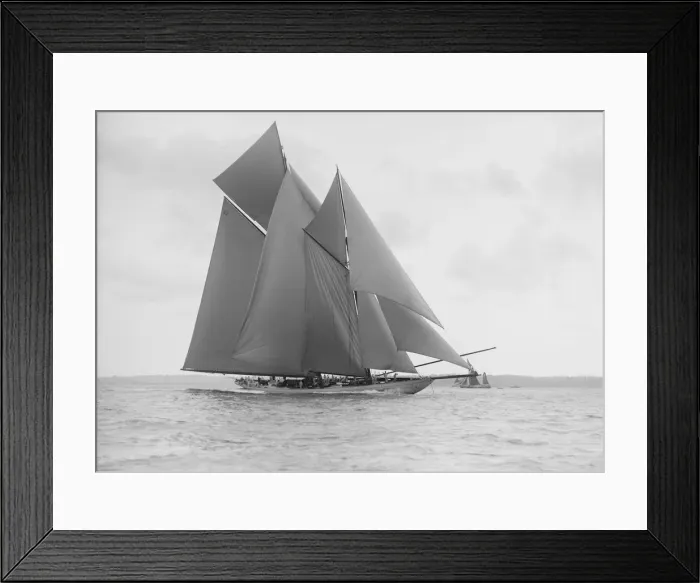 Framed Print : The 250 ton schooner Germania sails on a reach, 1913. Creator: Kirk & Sons of Cowes Framed Print : The 250 ton schooner Germania sails on a reach, 1913. Creator: Kirk & Sons of Cowes