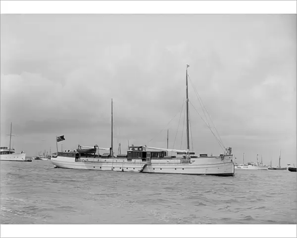 The motor yacht La Toquade at anchor, 1939. Creator: Kirk & Sons of Cowes