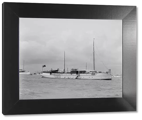 The motor yacht La Toquade at anchor, 1939. Creator: Kirk & Sons of Cowes