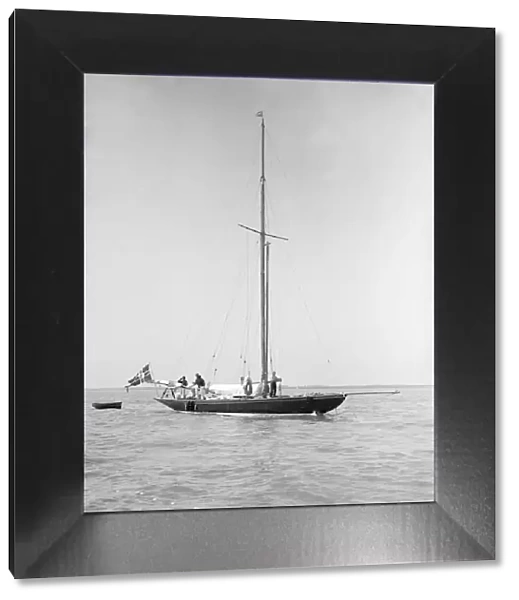 The sailing yacht Rollo at anchor, 1911. Creator: Kirk & Sons of Cowes