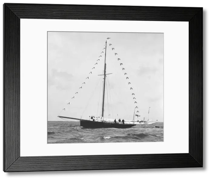 Framed Print : Bloodhound at anchor with prize flags, 1909. Creator: Kirk & Sons of Cowes Framed Print : Bloodhound at anchor with prize flags, 1909. Creator: Kirk & Sons of Cowes