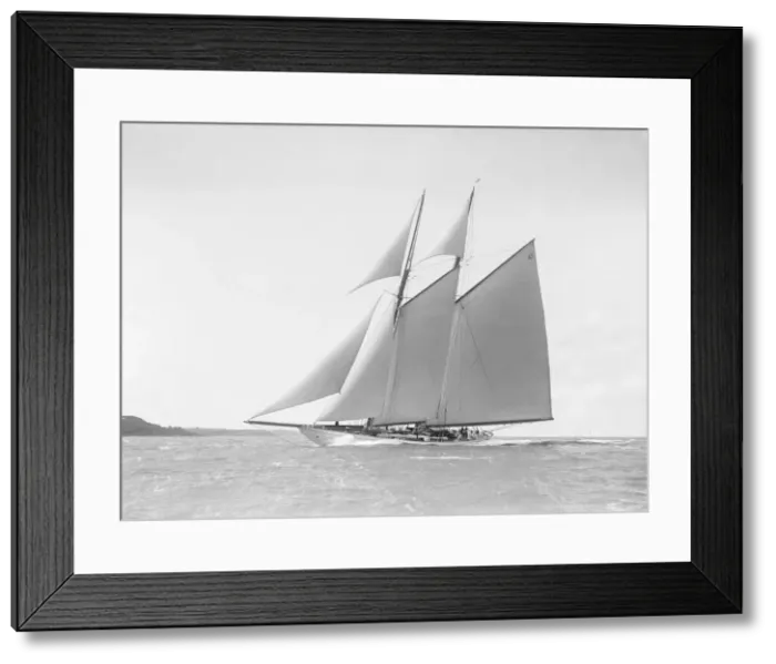 Framed Print : The 250 ton schooner Germania reaching in stiff wind, 1912. Creator: Kirk & Sons of Cowes Framed Print : The 250 ton schooner Germania reaching in stiff wind, 1912. Creator: Kirk & Sons of Cowes