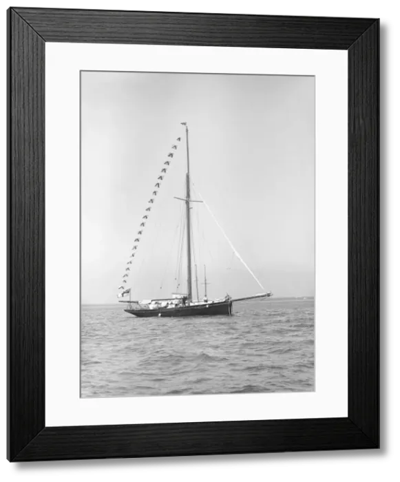 Framed Print : Bloodhound at anchor with flags, 1913. Creator: Kirk & Sons of Cowes Framed Print : Bloodhound at anchor with flags, 1913. Creator: Kirk & Sons of Cowes