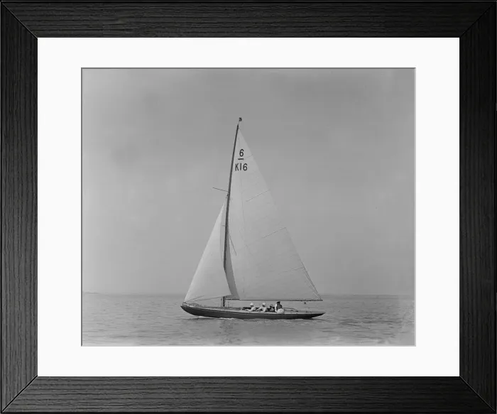 Framed Print : The 6 Metre class boat Jean (K16) sailing close-hauled, 1921. Creator: Kirk & Sons of Cowes