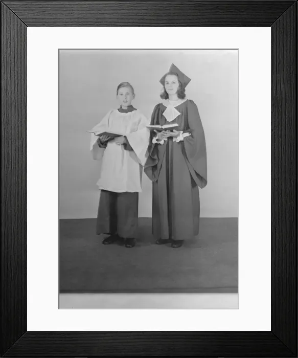 Framed Print : Girl and boy chorister, (Isle of Wight?), c1935. Creator: Kirk & Sons of Cowes Framed Print : Girl and boy chorister, (Isle of Wight?), c1935. Creator: Kirk & Sons of Cowes
