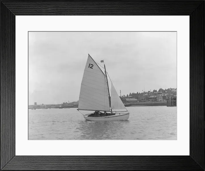 Framed Print : A Hamble River Class dinghy (No 12) sailing close-hauled, 1921. Creator: Kirk & Sons of Cowes Framed Print : A Hamble River Class dinghy (No 12) sailing close-hauled, 1921. Creator: Kirk & Sons of Cowes