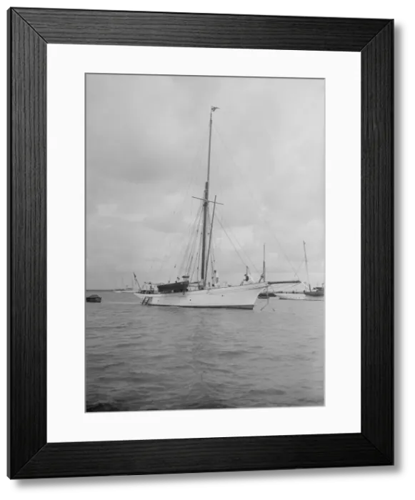 Framed Print : The cutter Yolande at anchor, 1912. Creator: Kirk & Sons of Cowes Framed Print : The cutter Yolande at anchor, 1912. Creator: Kirk & Sons of Cowes