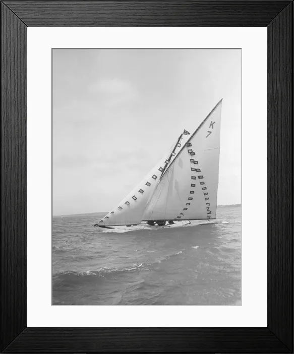 Framed Print : The 7 Metre Ginerva (K7) under sail with prize flags, 1912. Creator: Kirk & Sons of Cowes Framed Print : The 7 Metre Ginerva (K7) under sail with prize flags, 1912. Creator: Kirk & Sons of Cowes
