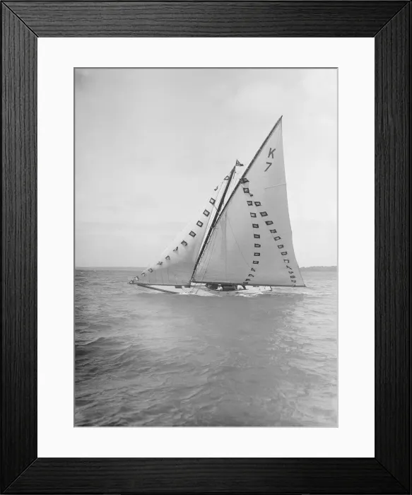 Framed Print : The 7 Metre Ginerva (K7) under sail with prize flags, 1912. Creator: Kirk & Sons of Cowes Framed Print : The 7 Metre Ginerva (K7) under sail with prize flags, 1912. Creator: Kirk & Sons of Cowes