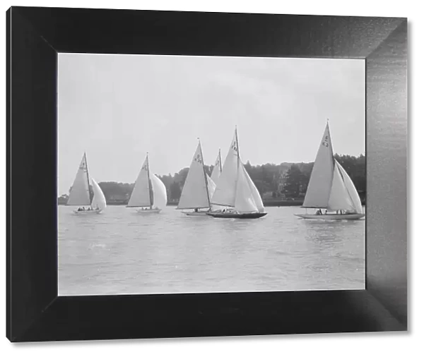 A group of 6 metre boats racing downwind, 1931. Creator: Kirk & Sons of Cowes