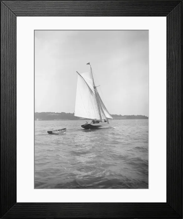 Framed Print : The cutter Citara under sail and towing tender, 1911. Creator: Kirk & Sons of Cowes Framed Print : The cutter Citara under sail and towing tender, 1911. Creator: Kirk & Sons of Cowes