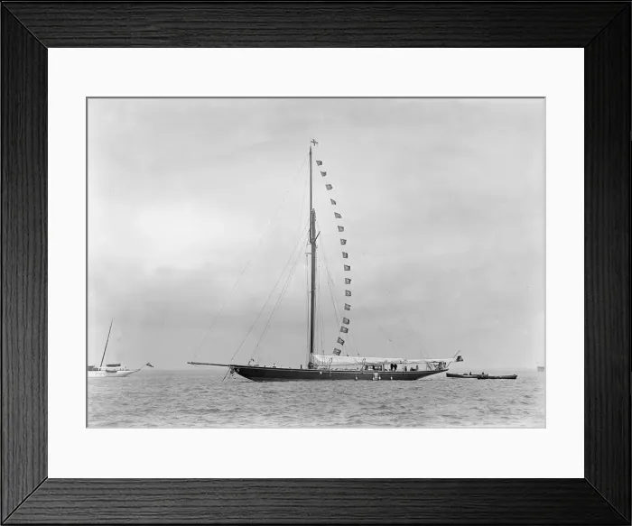 Framed Print : The 221 ton cutter Britannia at anchor with prize flags, 1921 Framed Print : The 221 ton cutter Britannia at anchor with prize flags, 1921